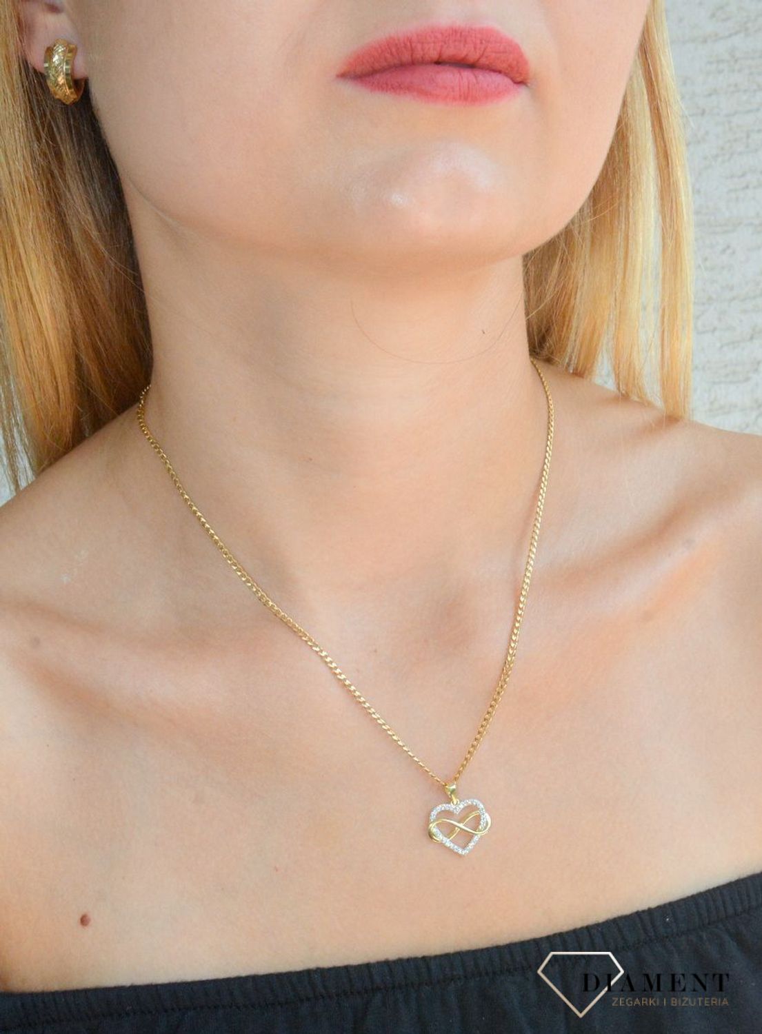 Złota zawieszka 375 serduszko ze znakiem nieskończoności ZA 3432A 375. Złota zawieszka serduszko z cyrkoniami. Zawieszka złota damska. Złoty damski wisiorek. Złota zawieszka nieskończoność.Zawieszka złota na pr.jpg